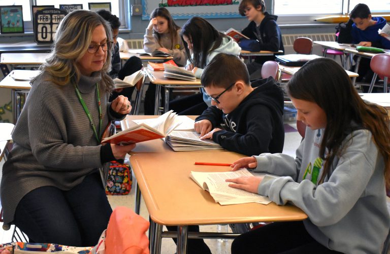 Teacher reading to students