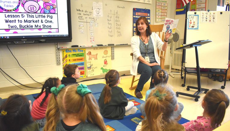 teacher reading to students