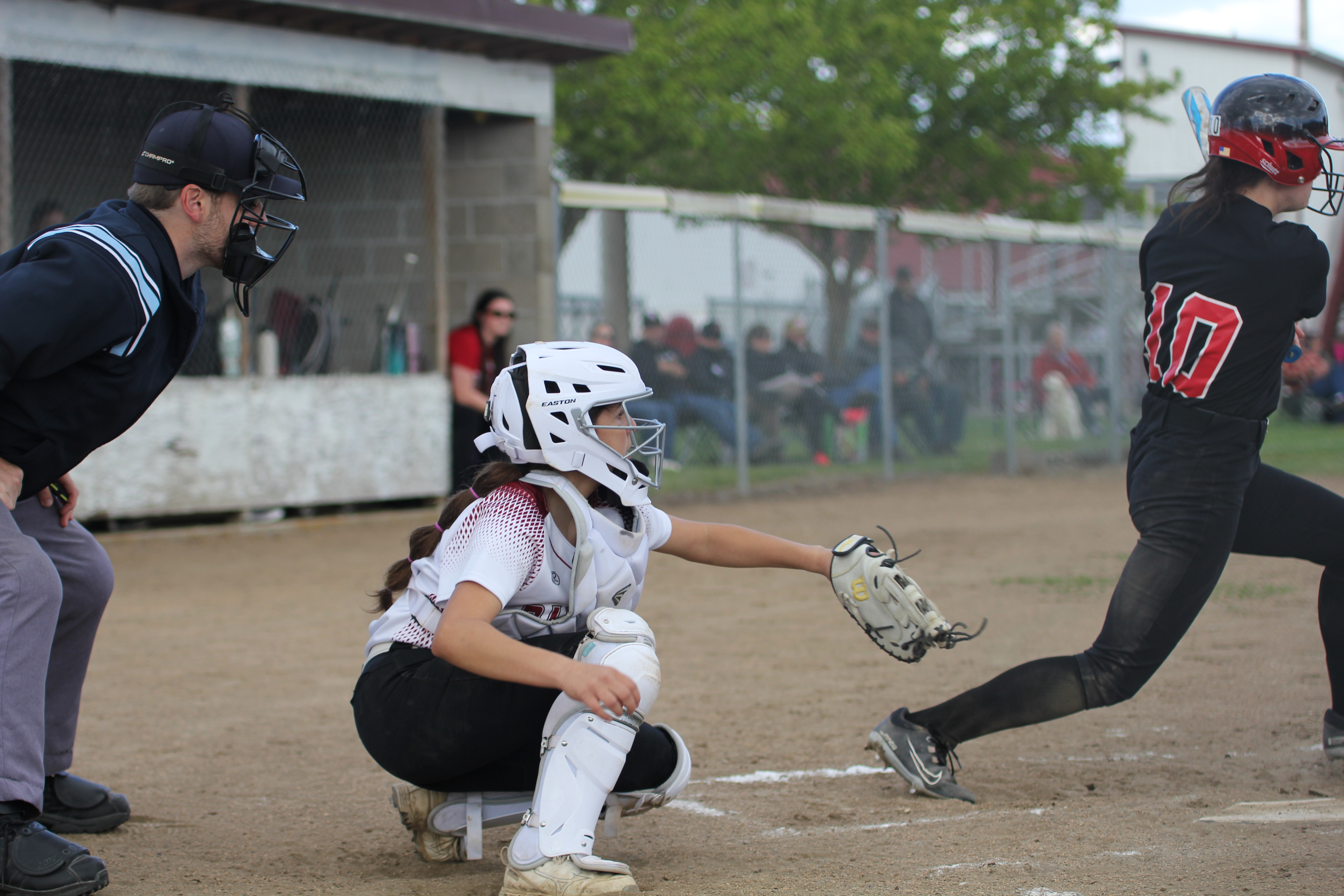 softball player in position to catch ball