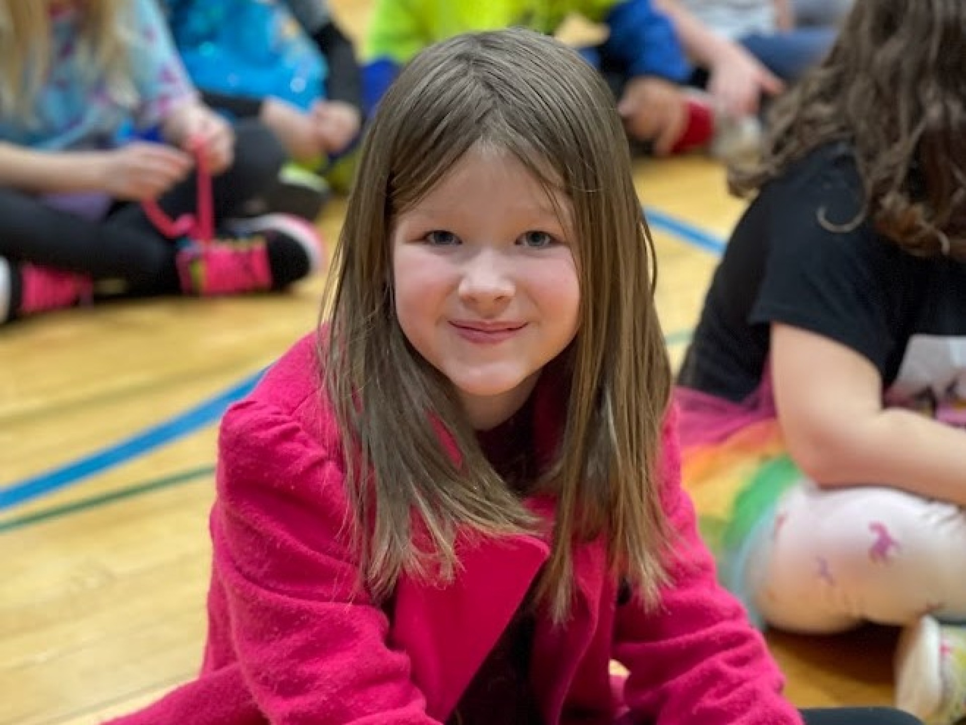 Student smiling in the gym