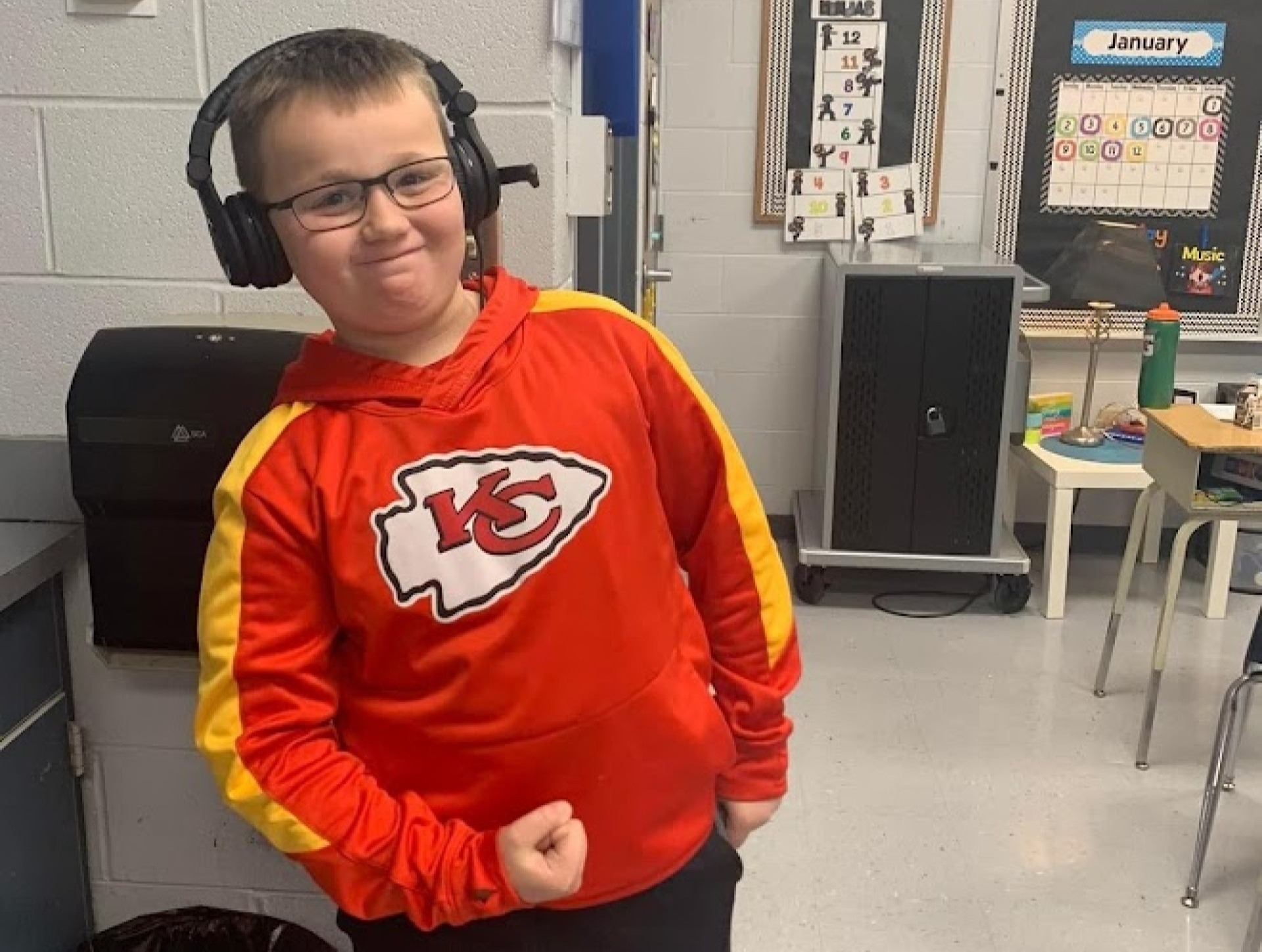 Student smiling with headphones