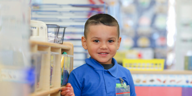 kid smiling at the camera