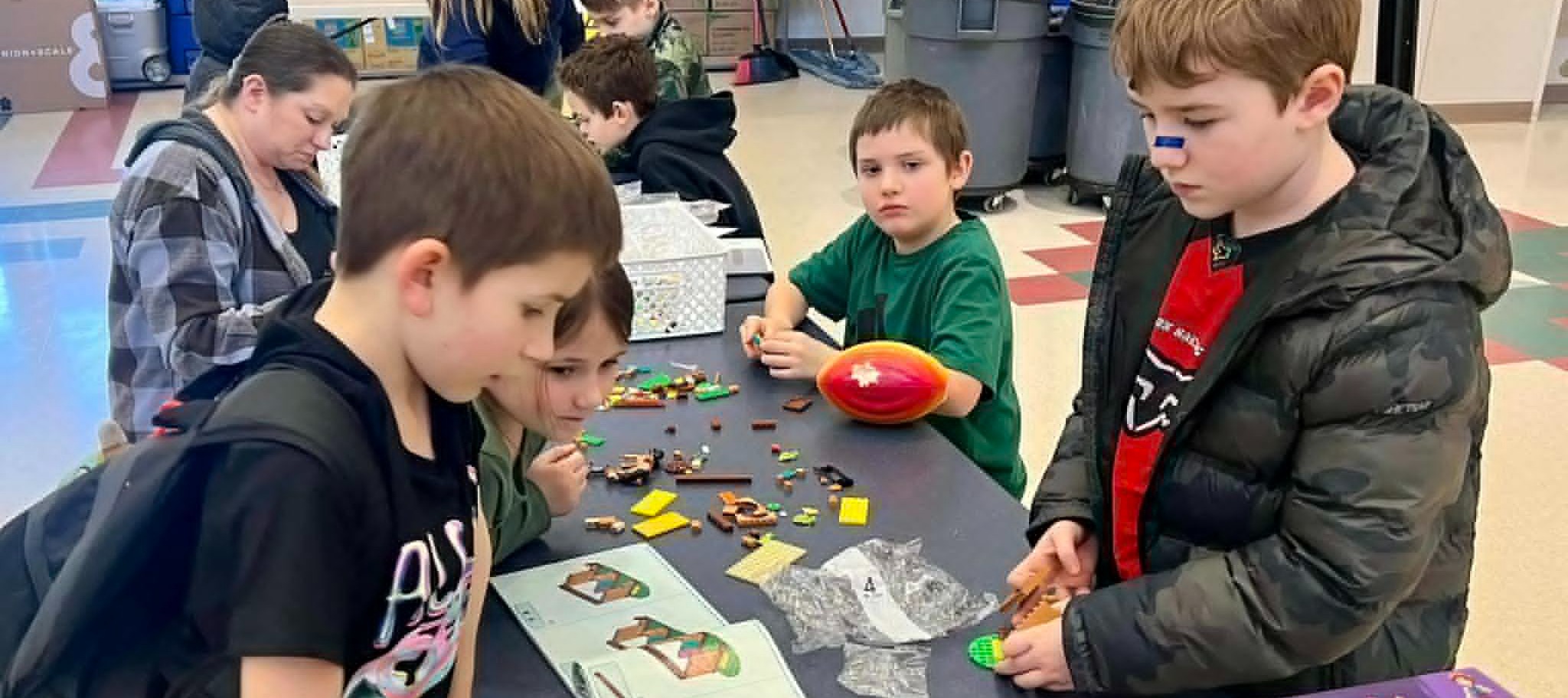 Kids building with Legos