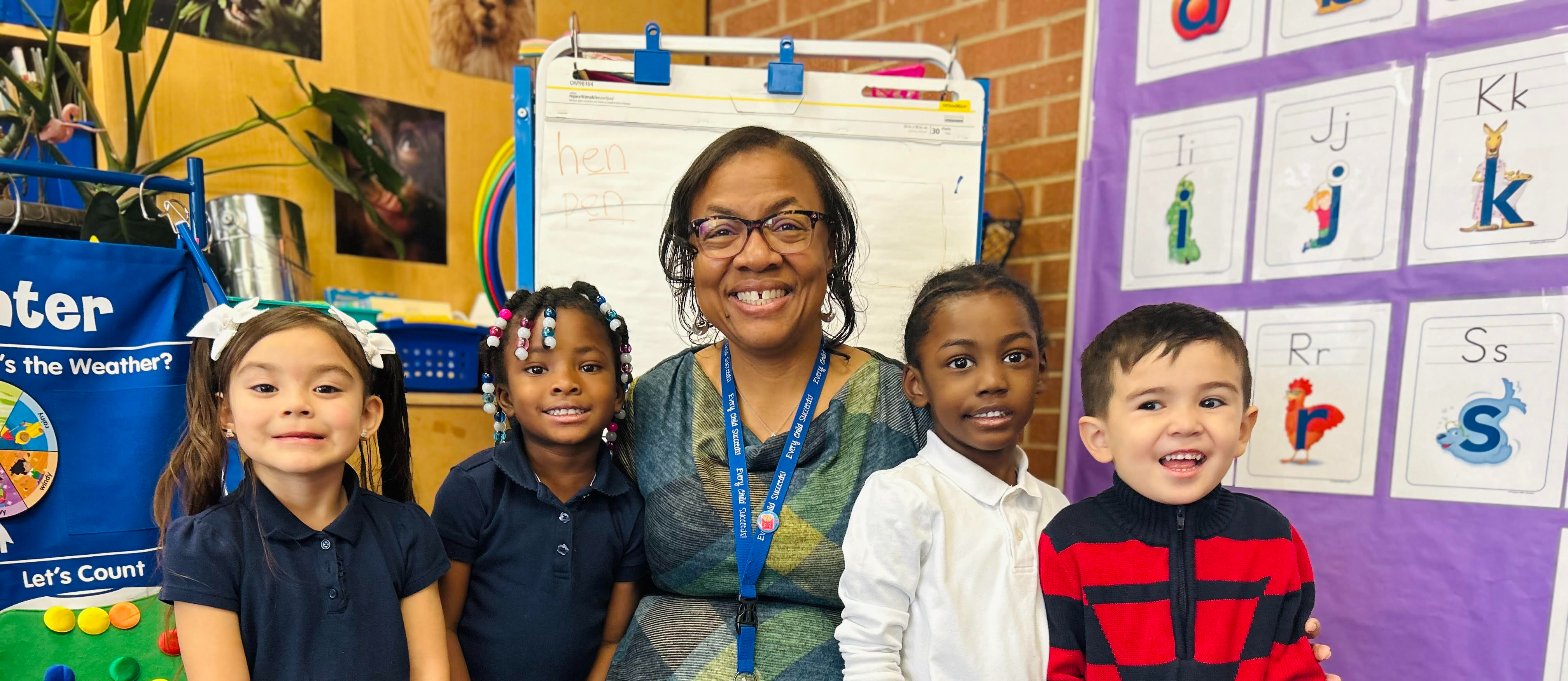 Teacher with students