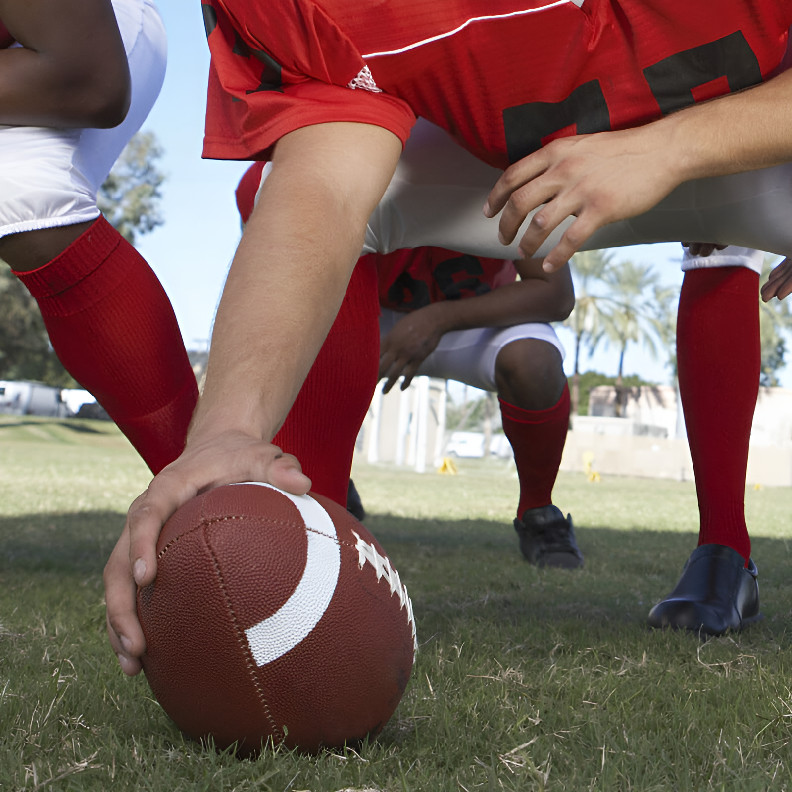 guy with football ball on the field