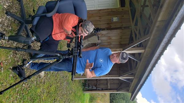 Memphis Lafferty and his father Chris Lafferty with their hunting gun.