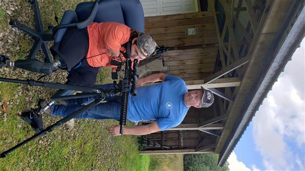 Memphis Lafferty and his father Chris Lafferty with their hunting gun.