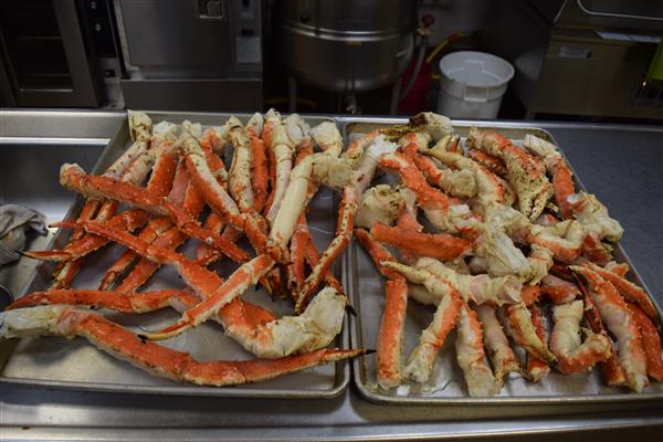 Crab legs are a popular seafood dish. They are typically steamed or boiled, and then served with melted butter or a dipping sauce.