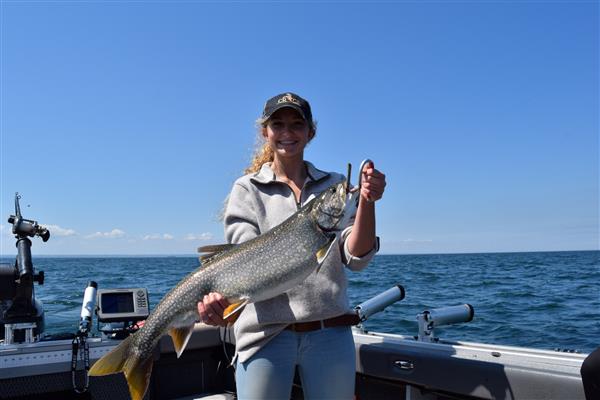 A man holding a large fish