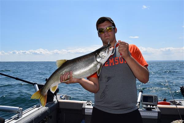 A man holding a large fish