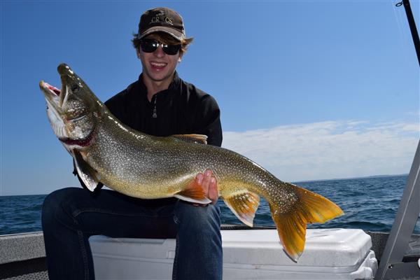 A man holding a large fish