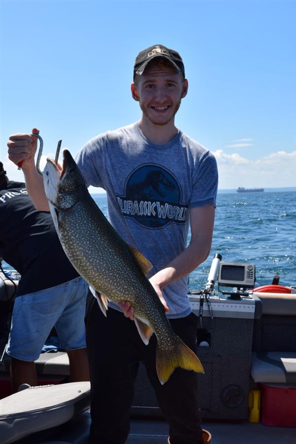 A man holding a large fish