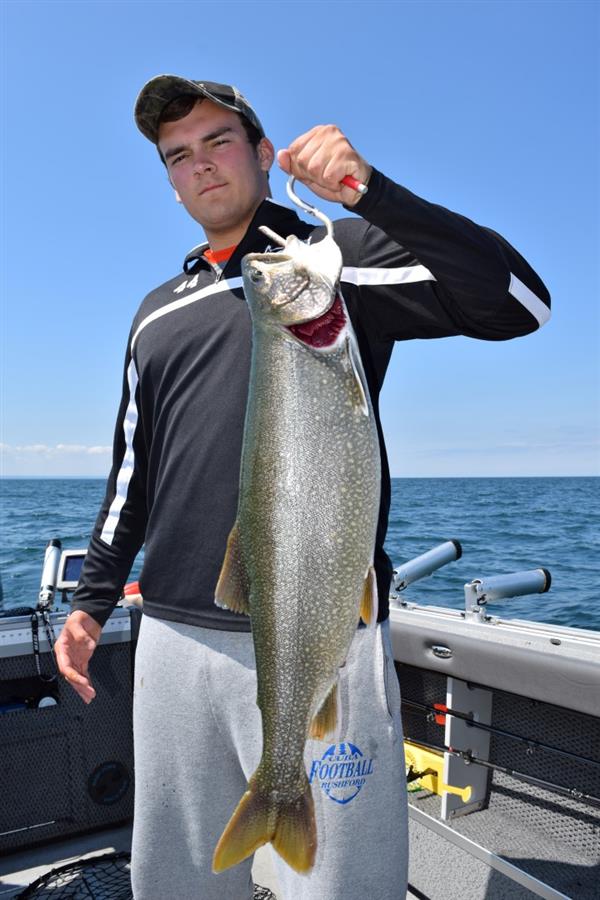 A man holding a large fish