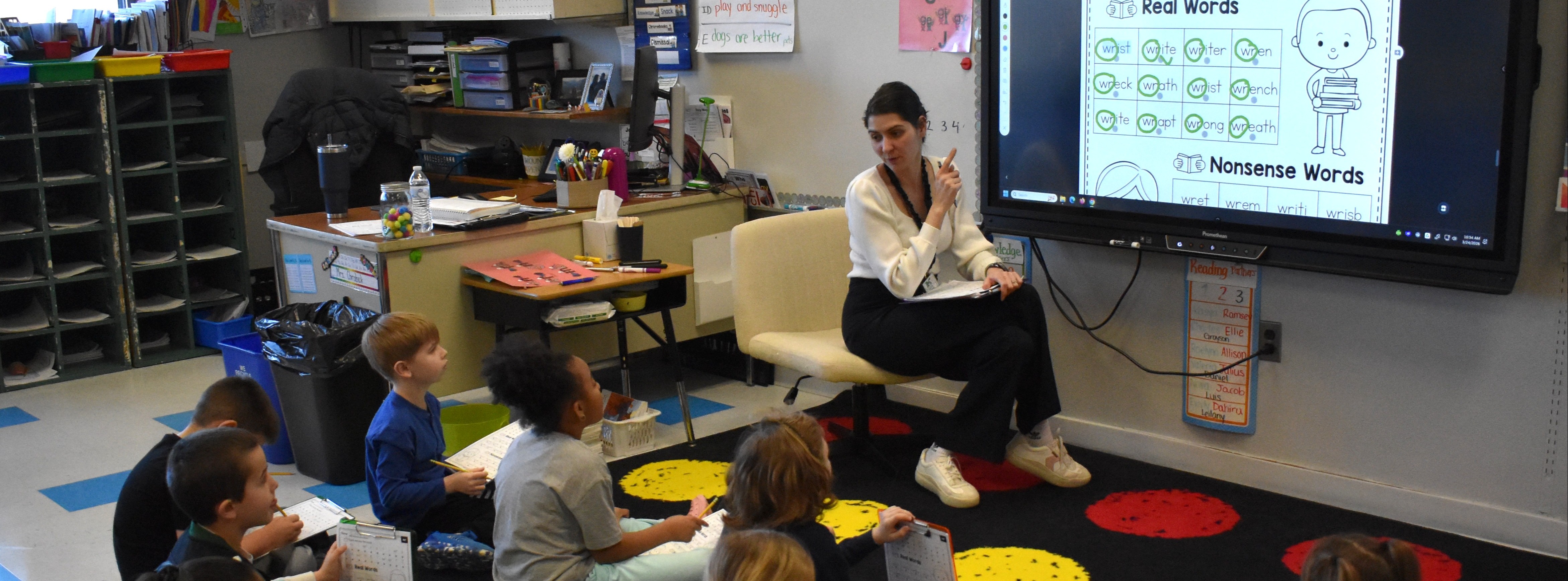 student in classroom at work