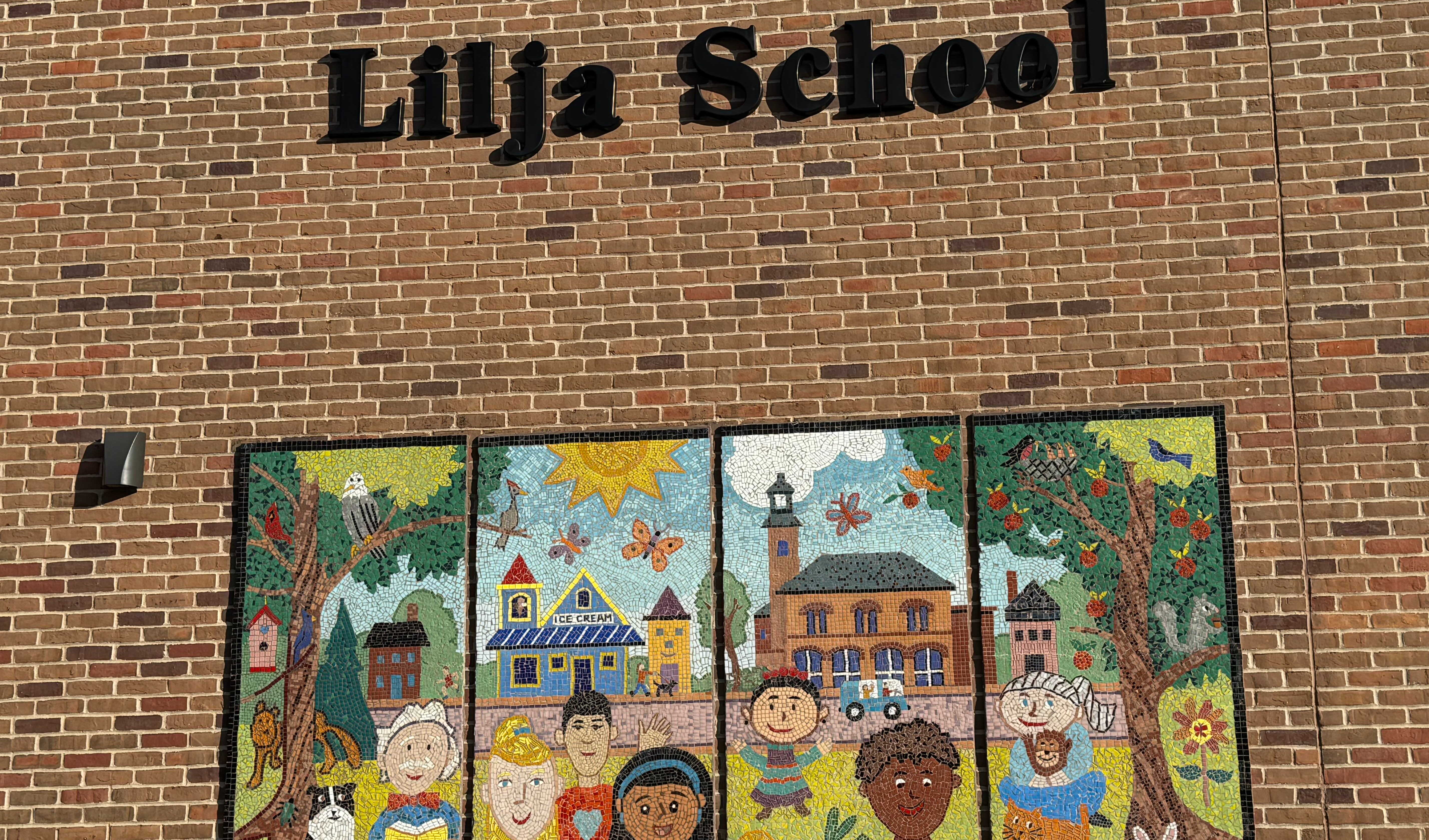 An image of the gorgeous mosaic mural outside of the Lilja School.