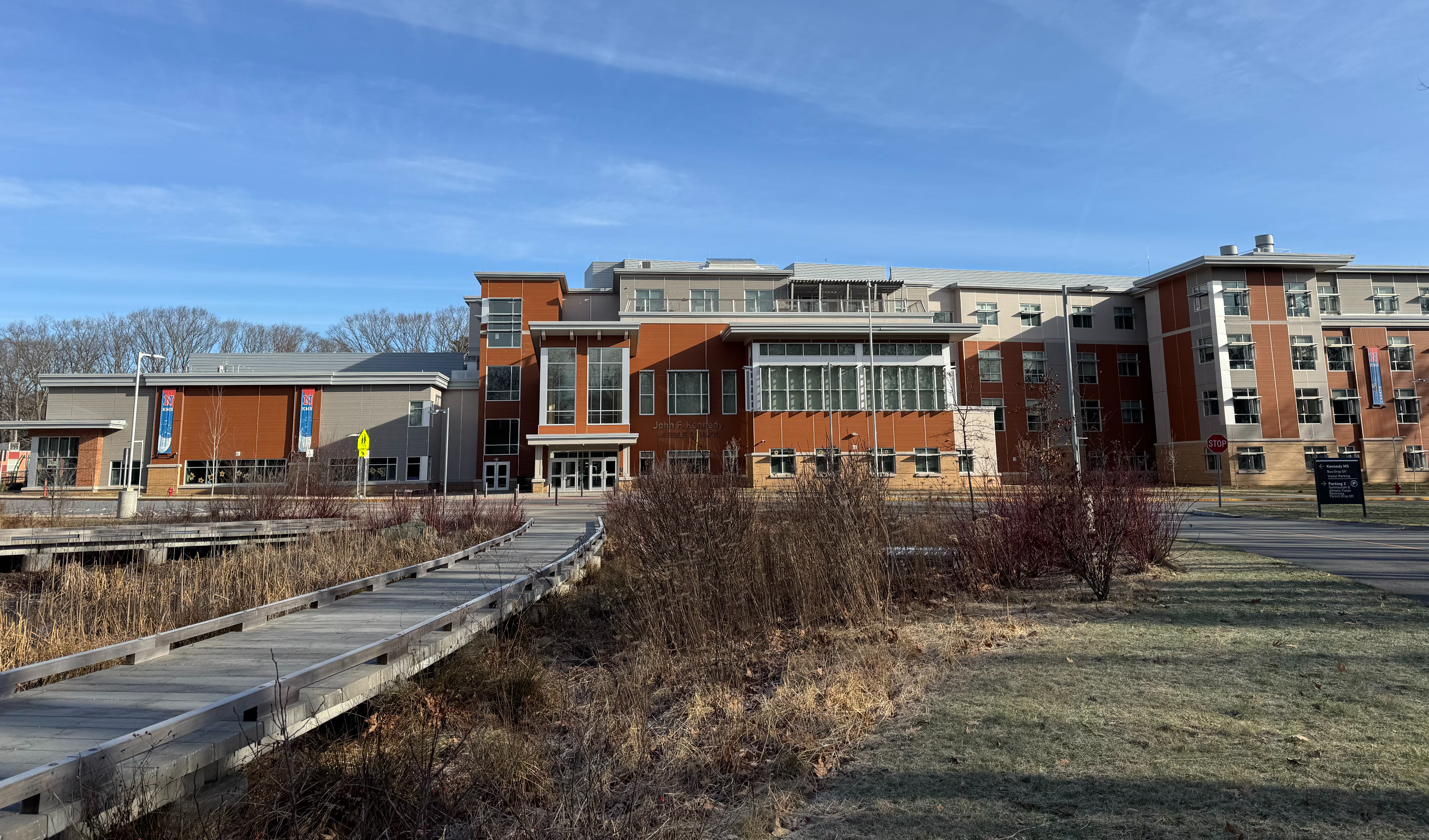 An image of Kennedy Middle School on a sunny but chilly fall day.