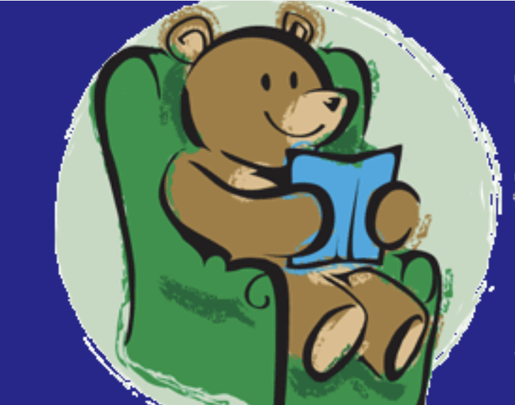 bear reading in the couch 