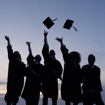 grads tossing caps