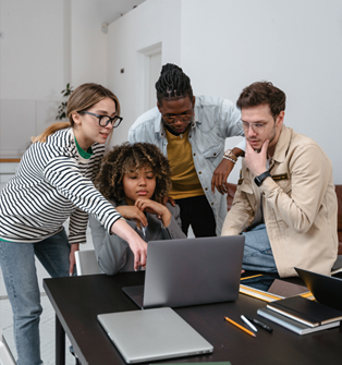 people working in front of the laptop