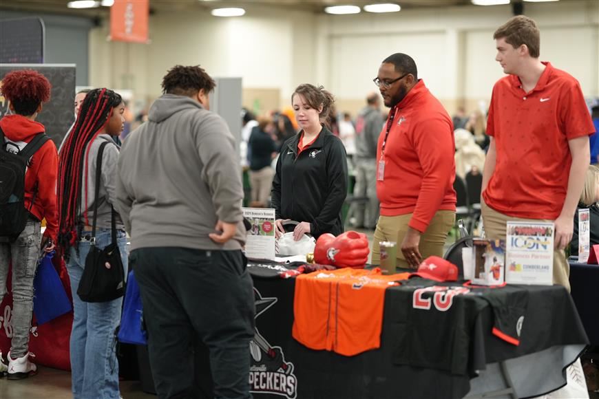 Students engaging with business partners at the 2024 career fair.