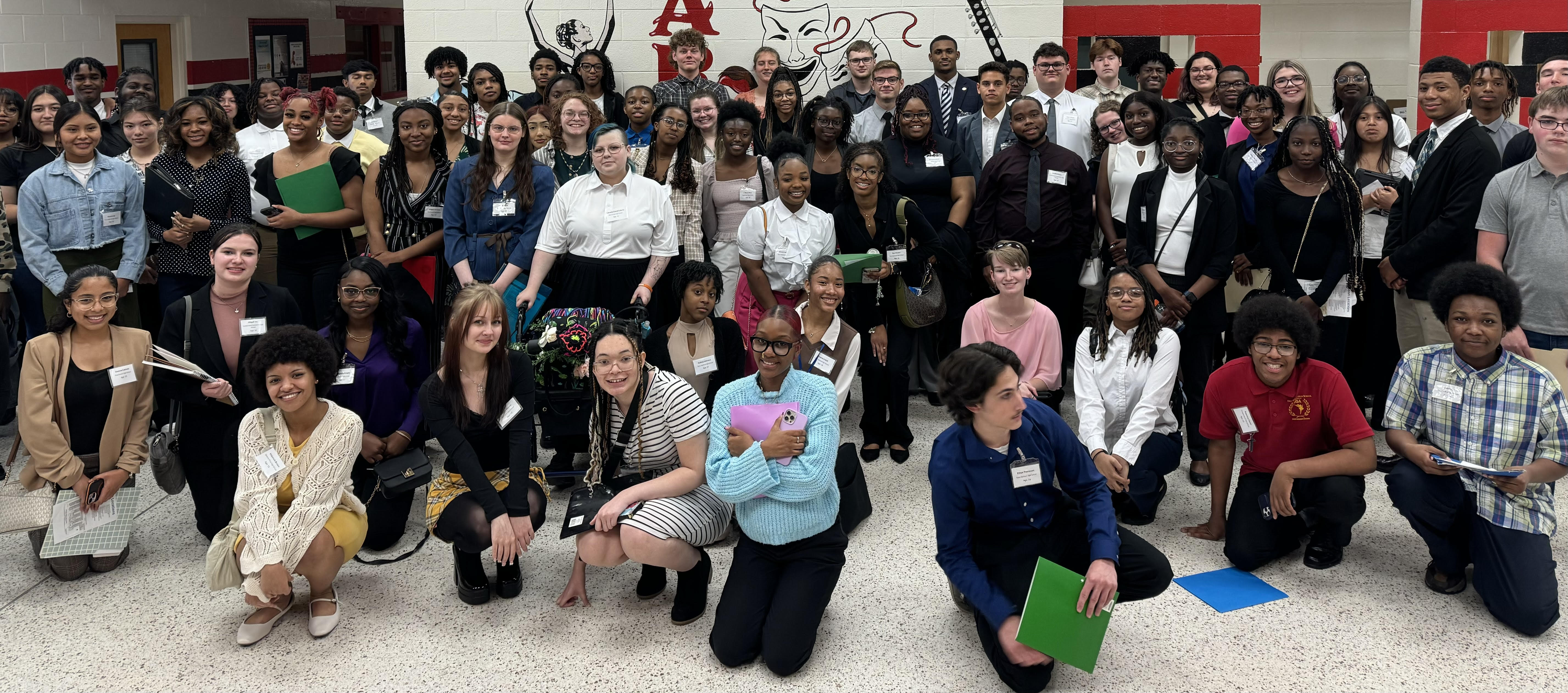 A large group of high school students posing for a photo after being selected to be a part of the summer internship program called ICON