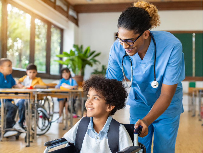 male nurse with child in wheel chair