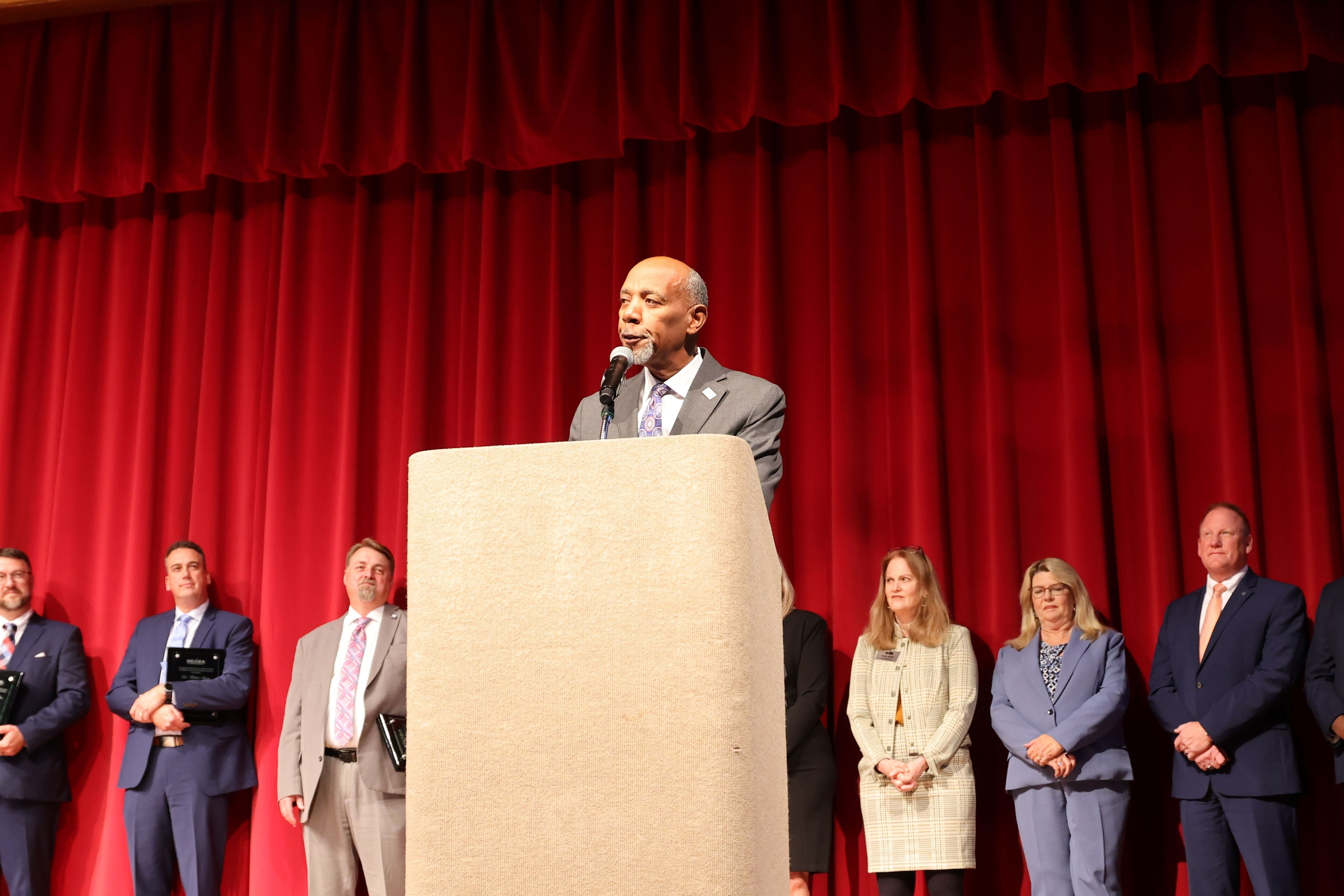 CCS Superintendent Dr. Connelly speaks at podium