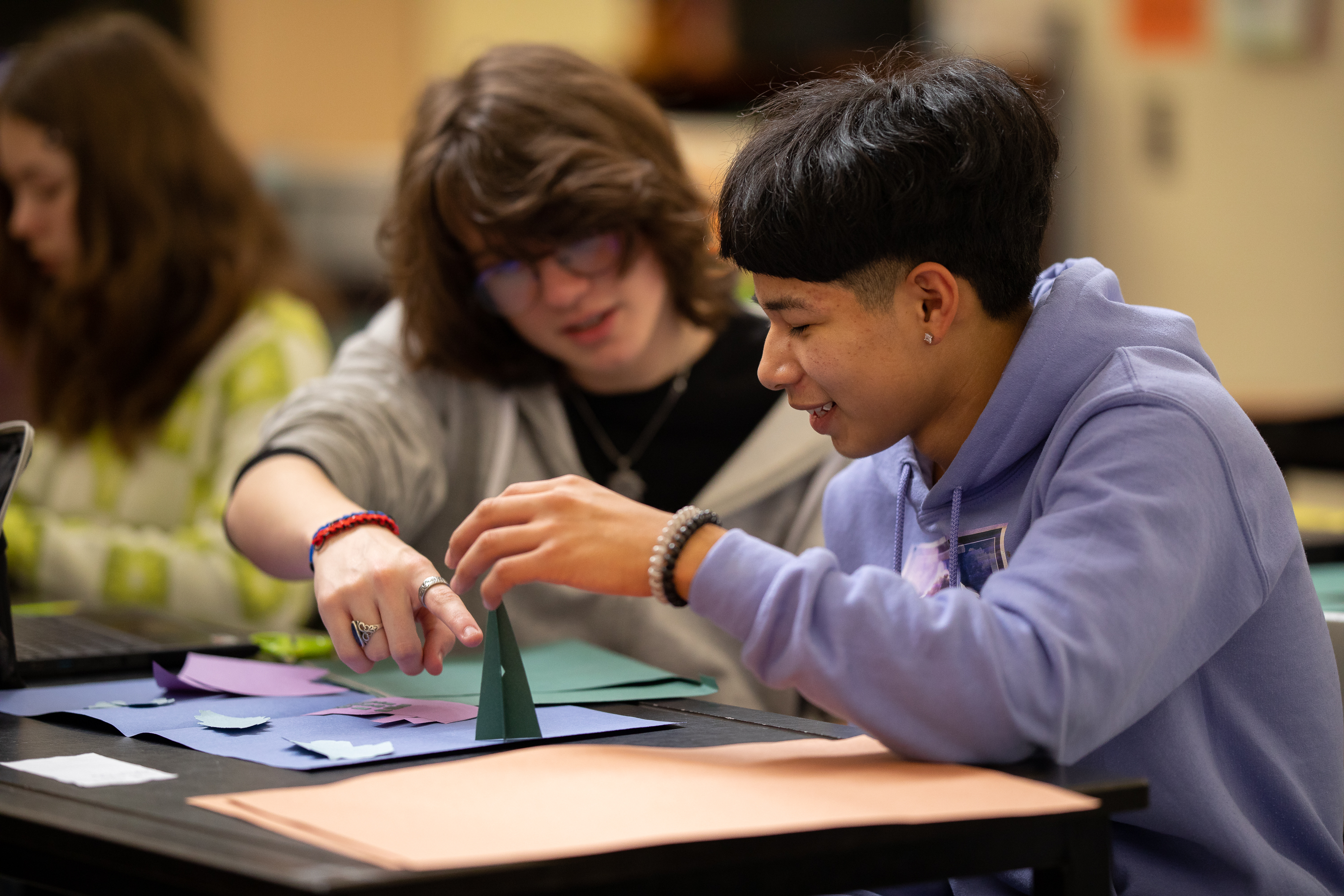 Two students discussing art