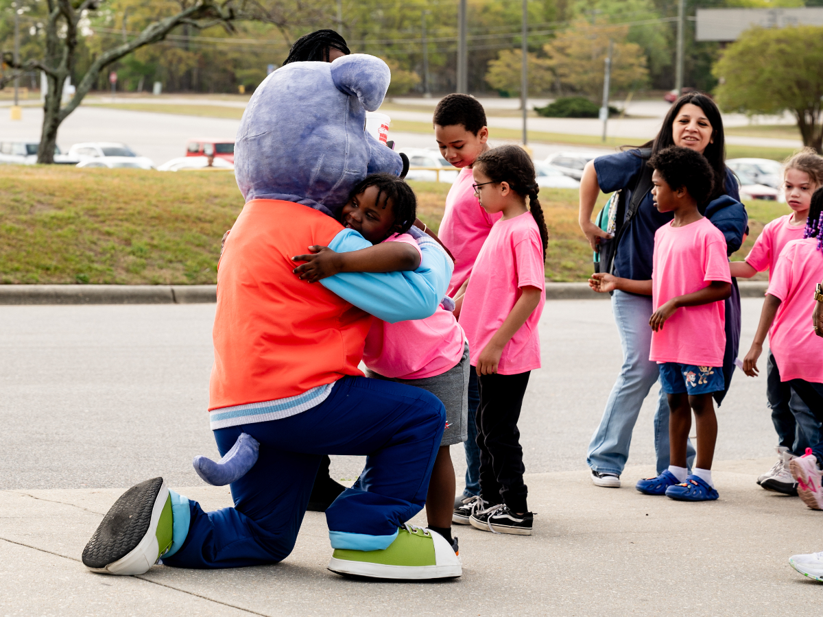 Cooper with Students