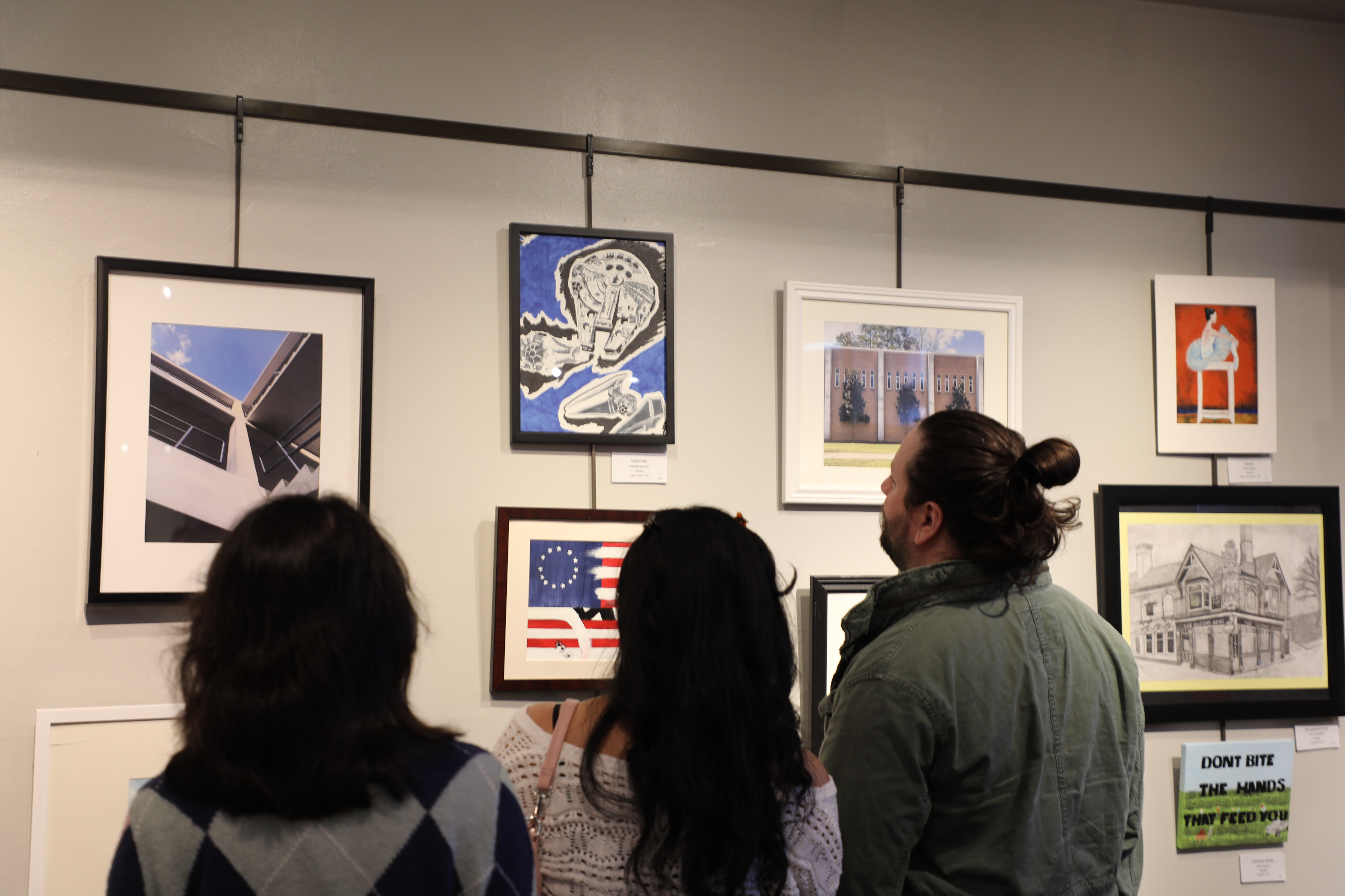 Guests enjoying an art exhibit