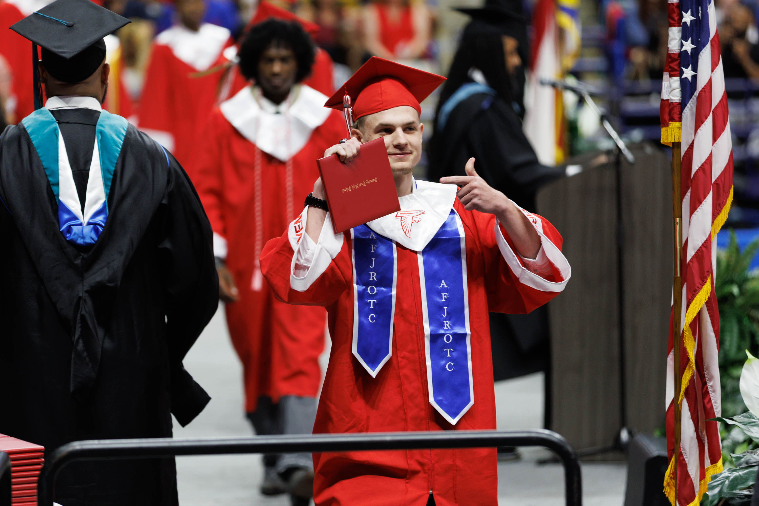 grad with diploma