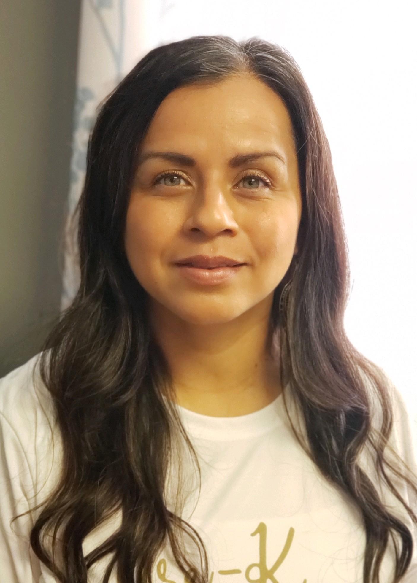 A portrait of SanJuanita Soliz, a family service coordinator