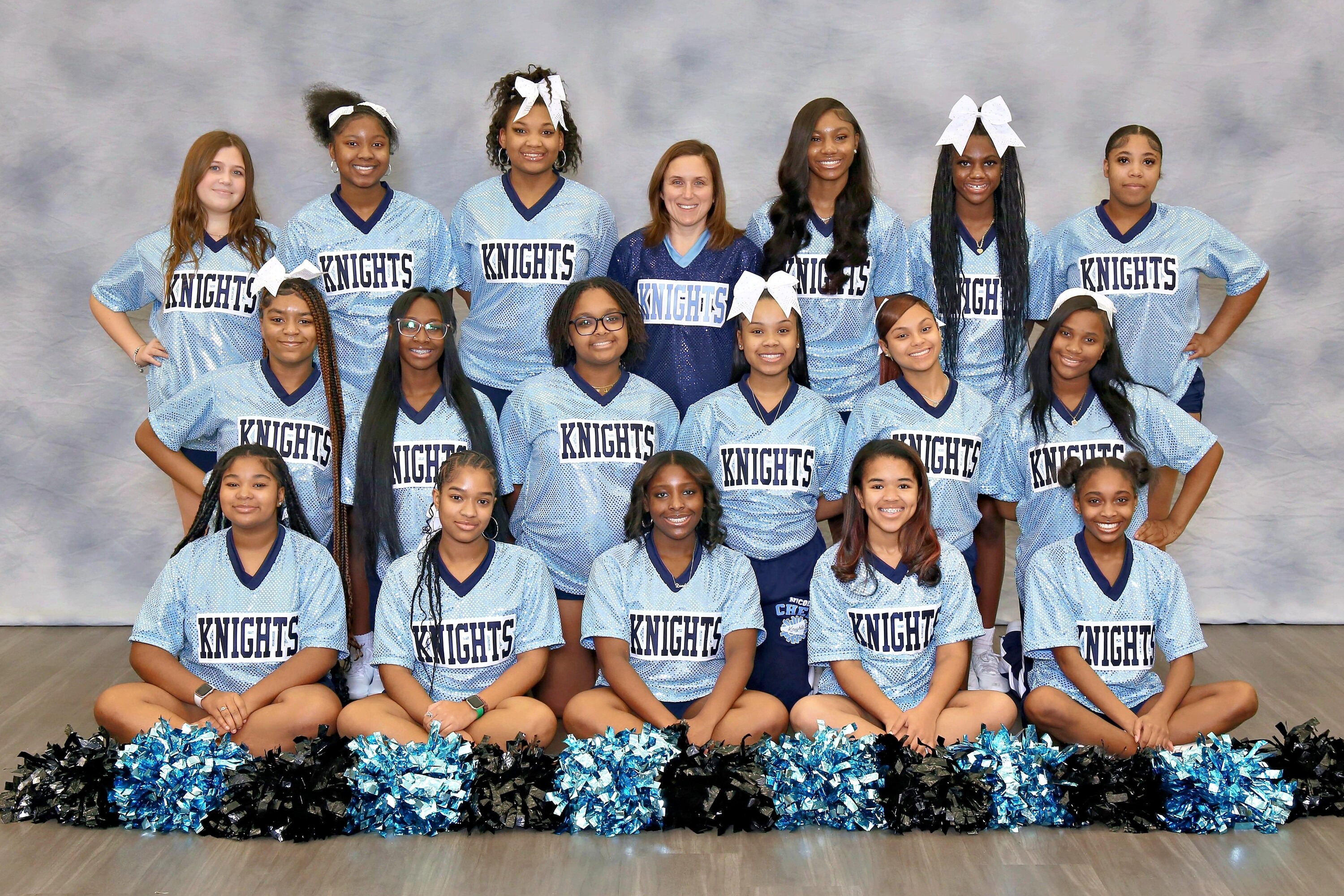 cheerleading team smiling for picture