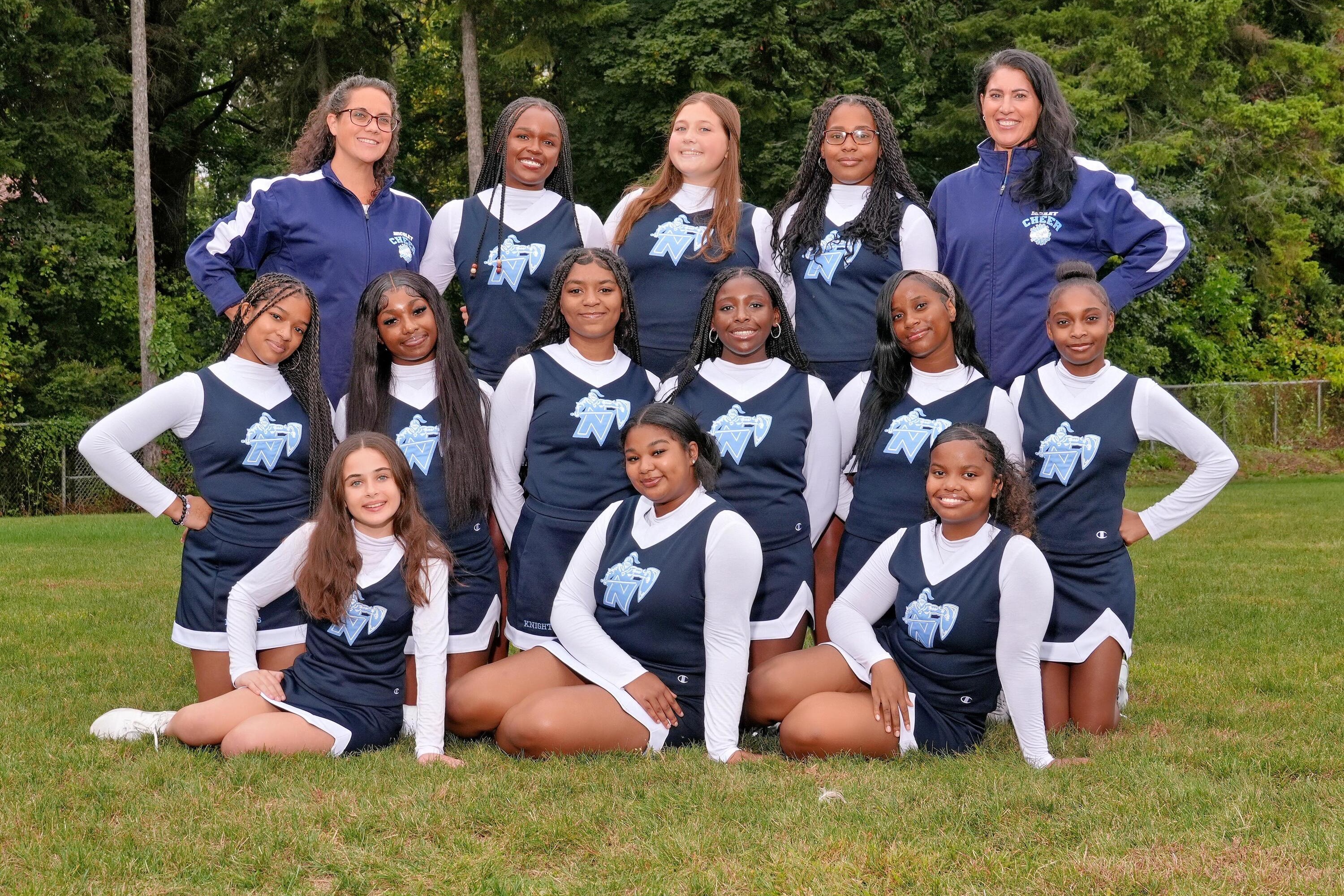 cheerleading team smiling for picture