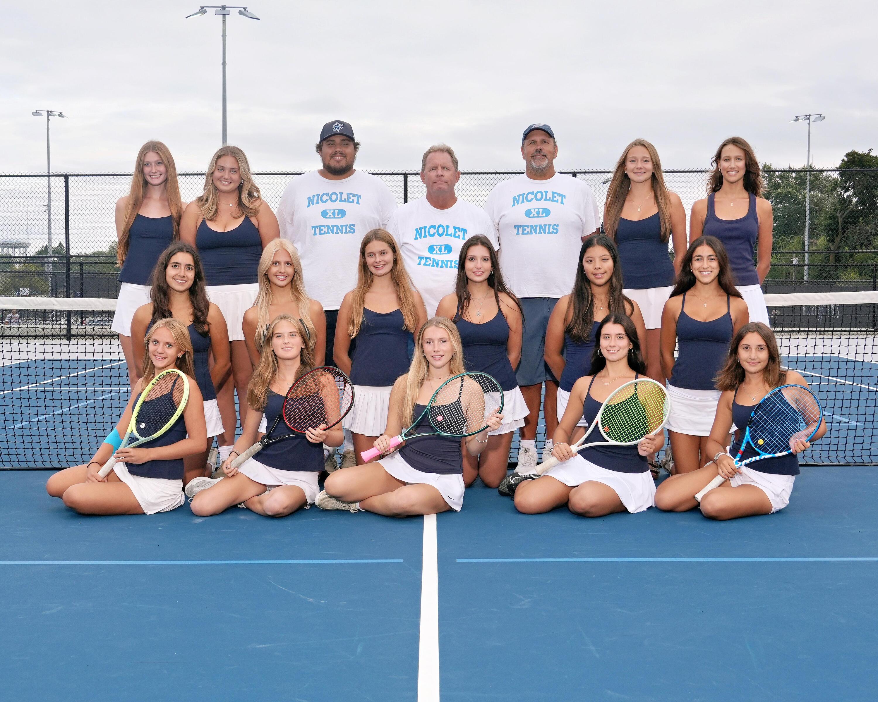 a picture of girls tennis players smiling for a picture