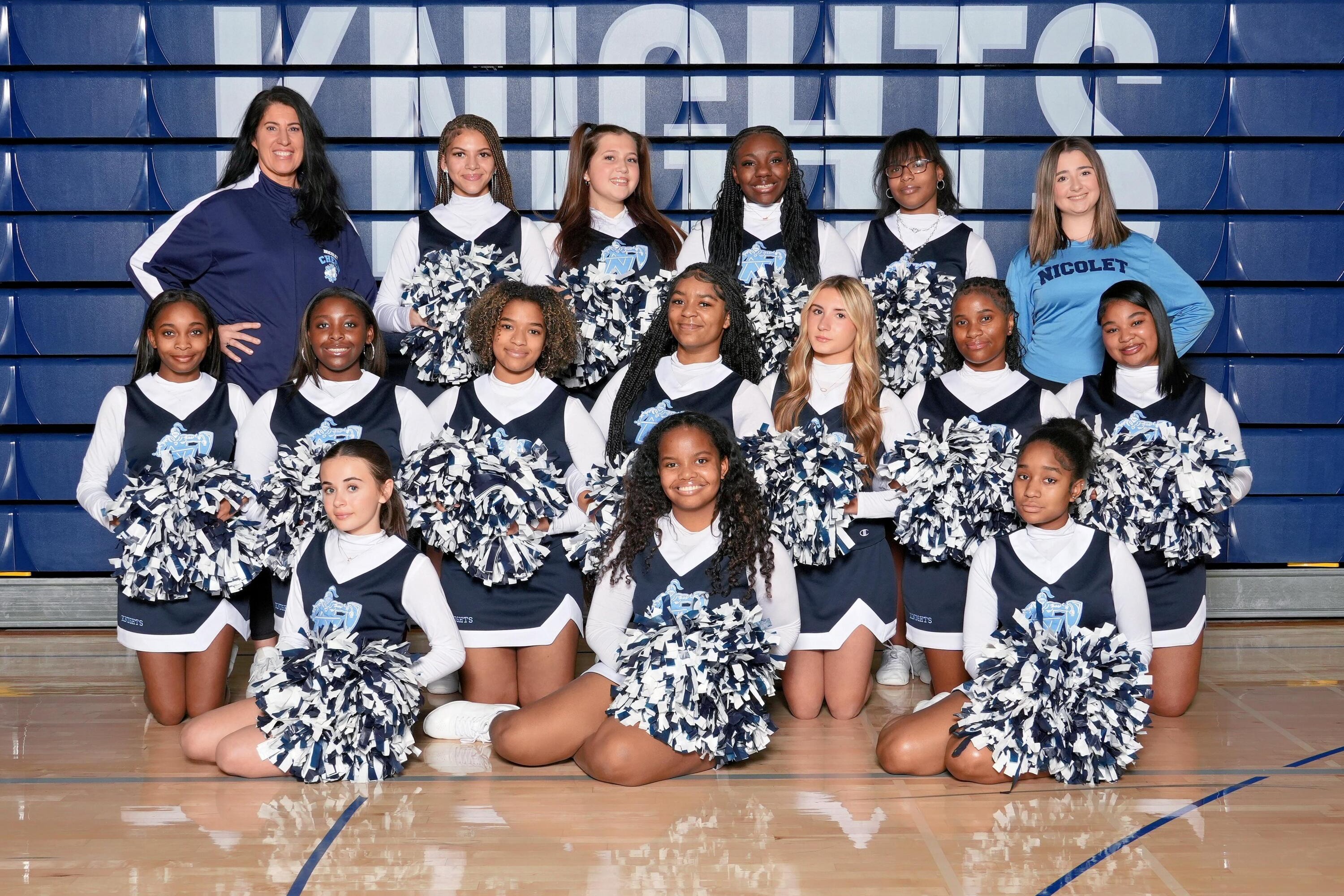cheerleading team smiling for picture