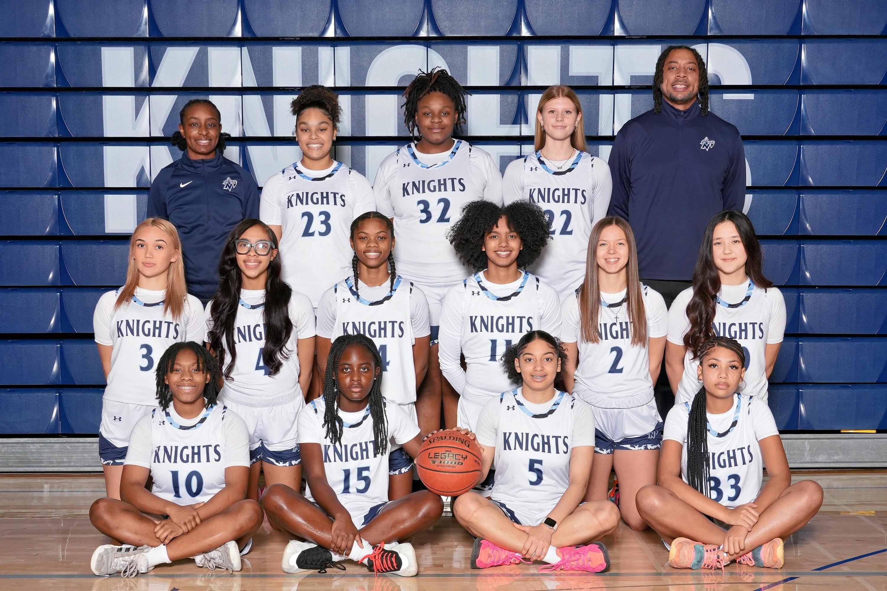 varsity girls basketball players smiling