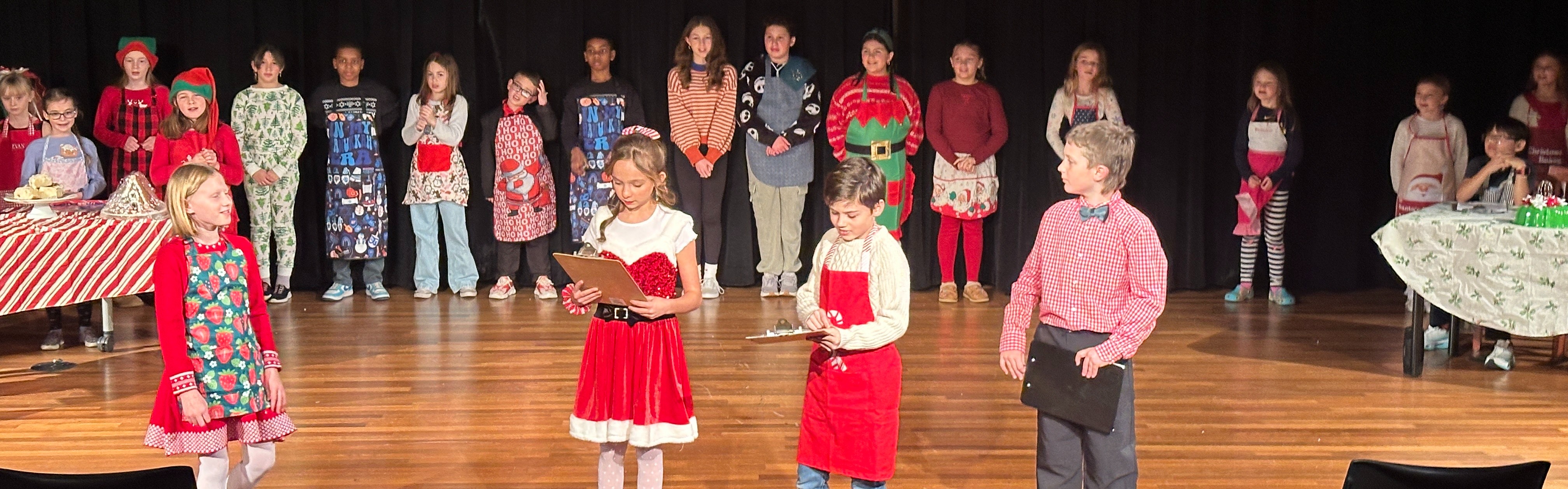 a picture of kids performing for a holiday musical