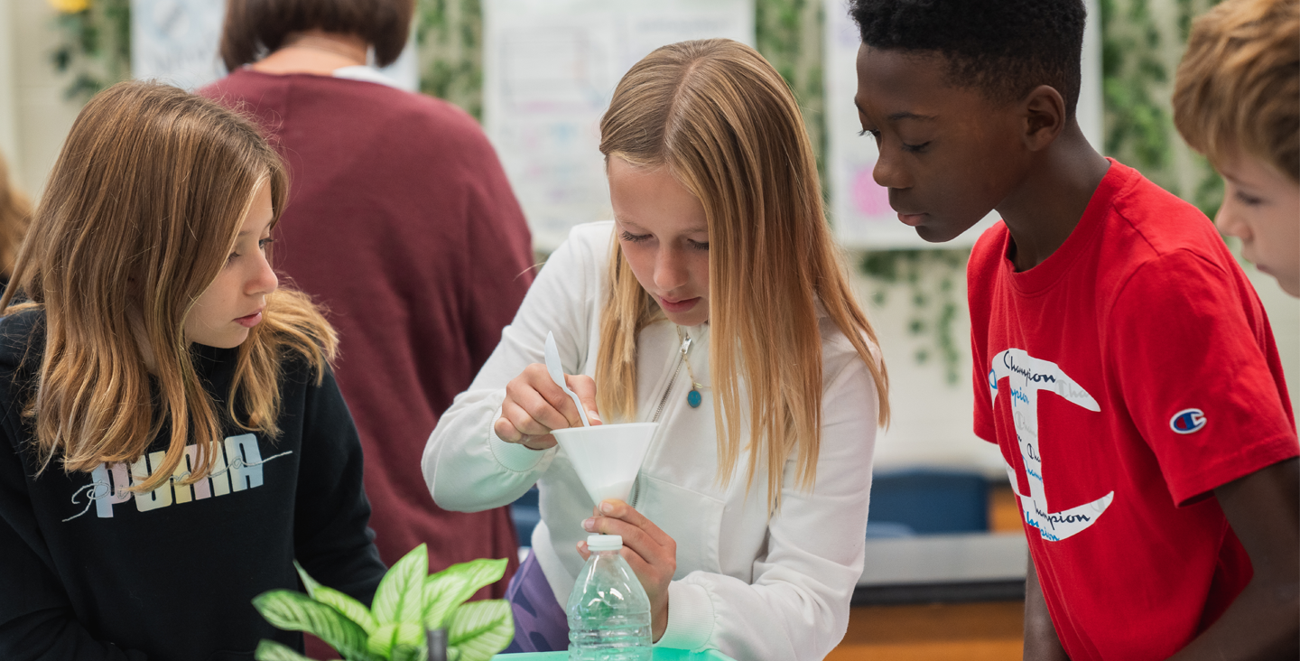 students conducting a science experiment