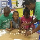 students and teacher doing an activity 