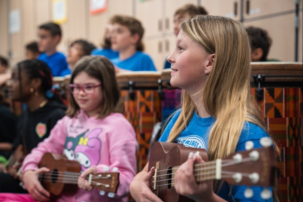 Students playing musical instruments