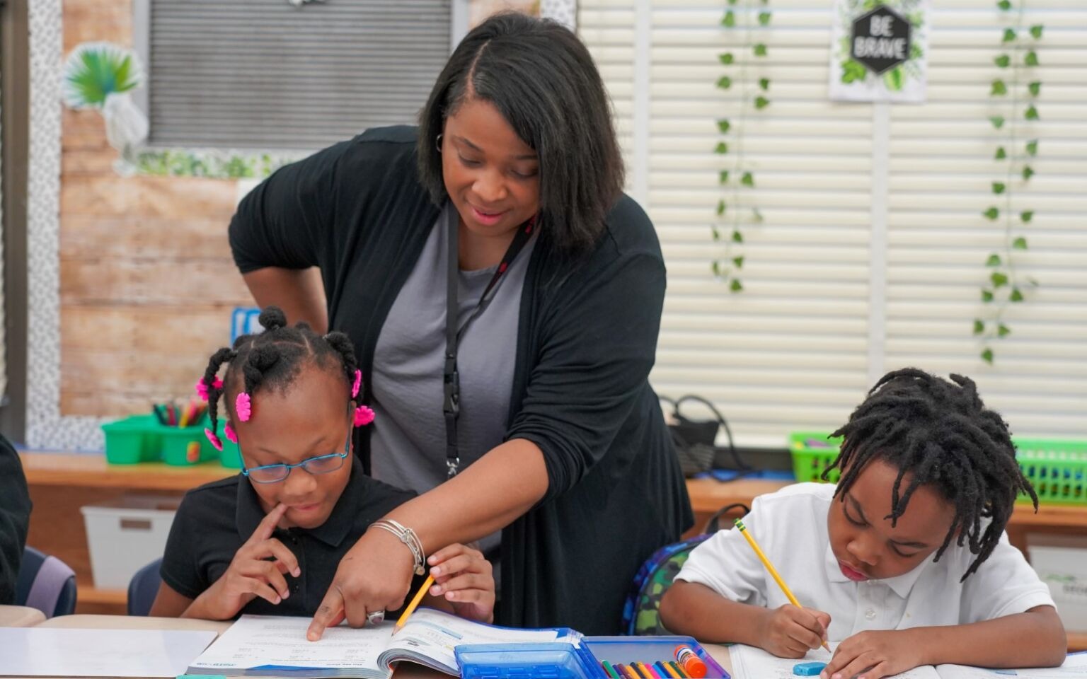 Teacher helping a student