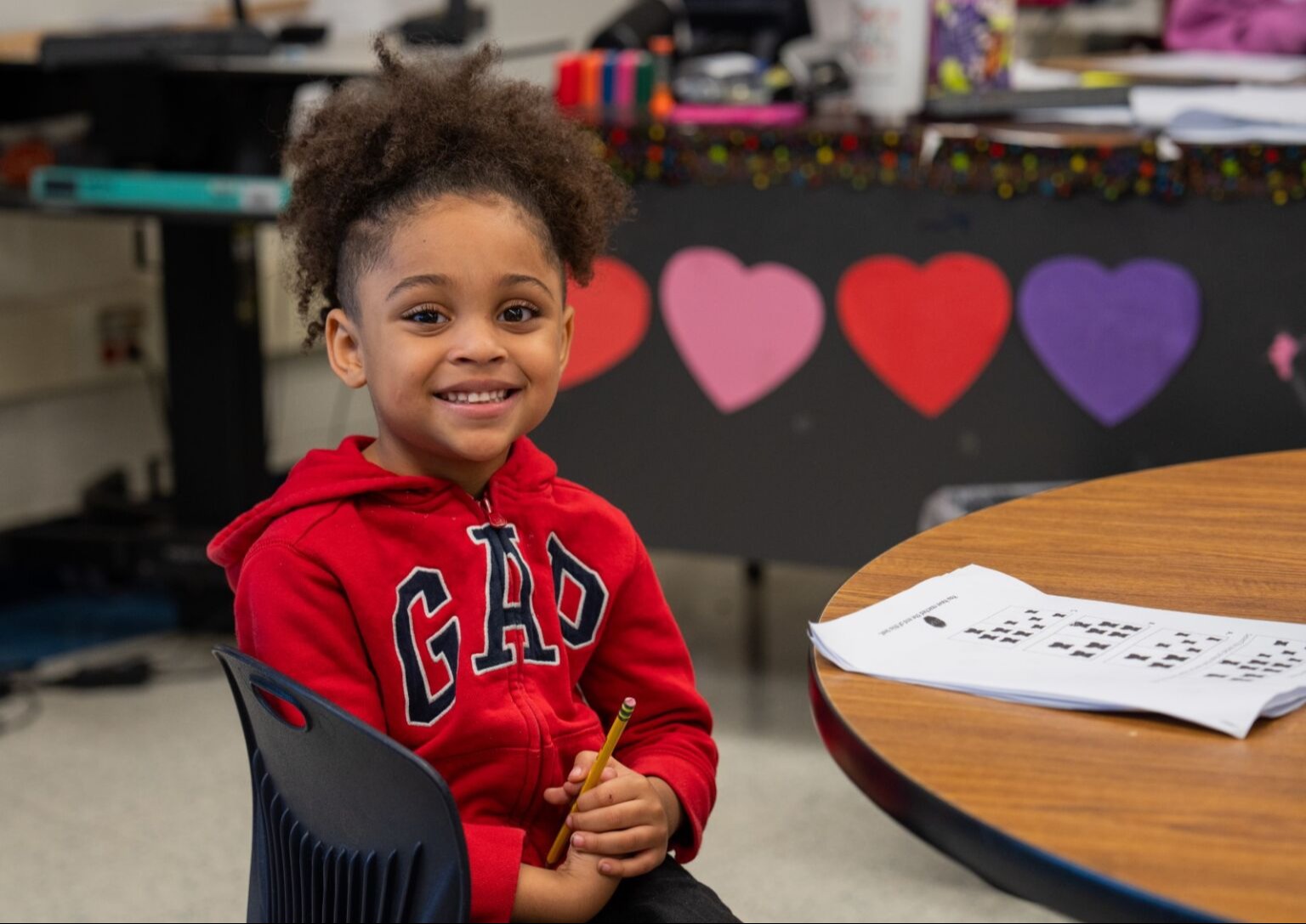 Student smiling at the camera