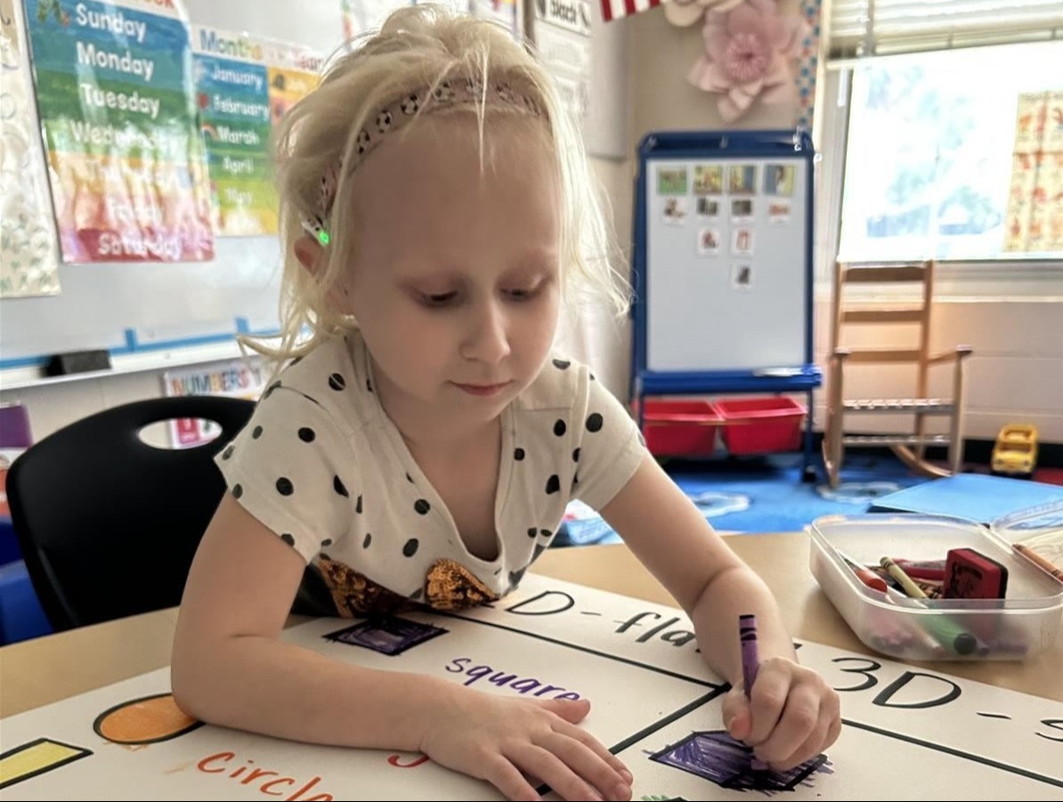 elementary-aged girl playing