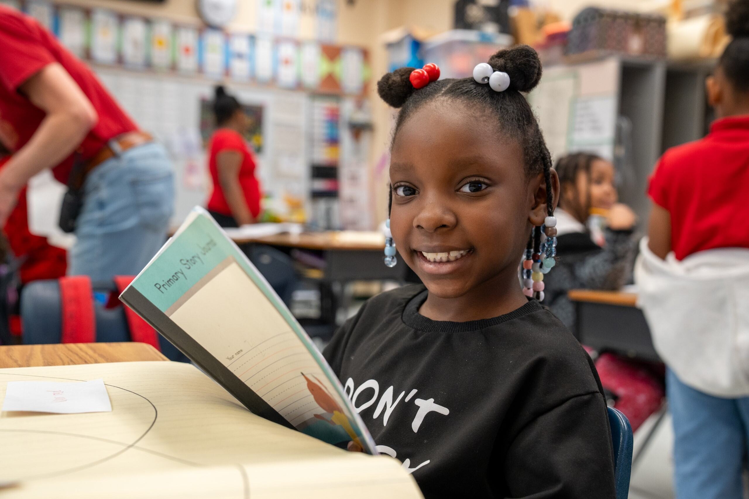 Student smiling at the camera
