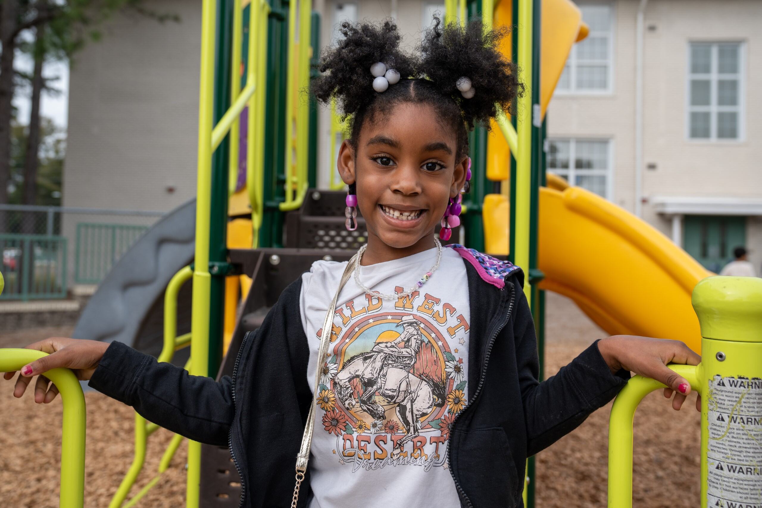 Student playing on the playground