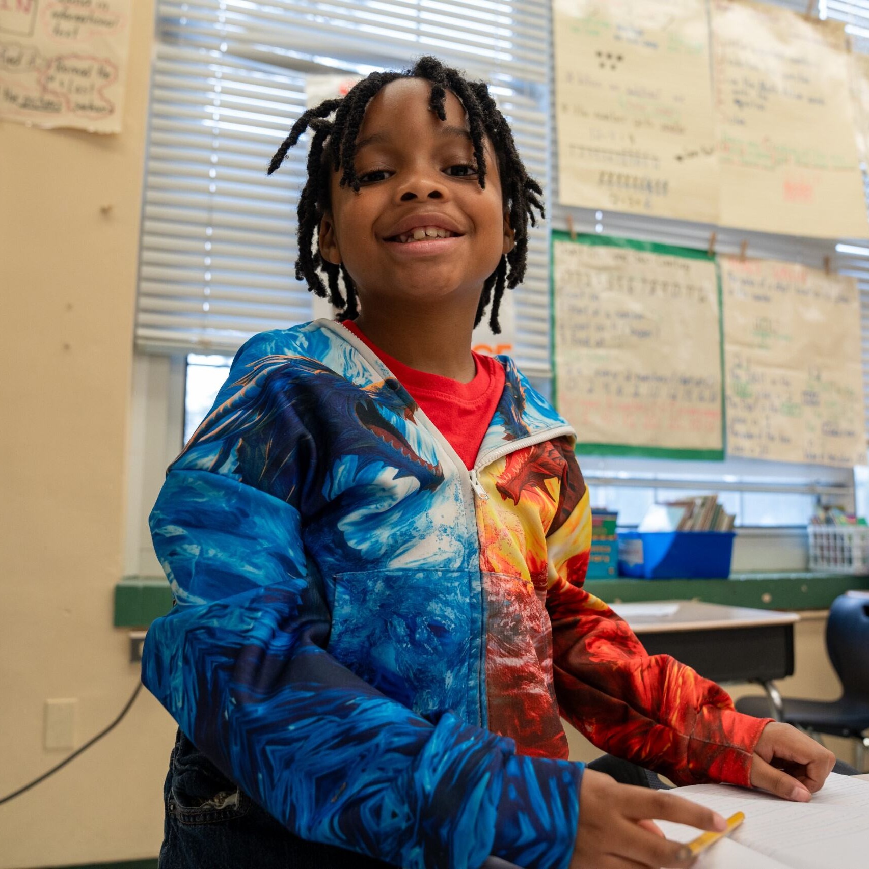 Student smiling at the camera