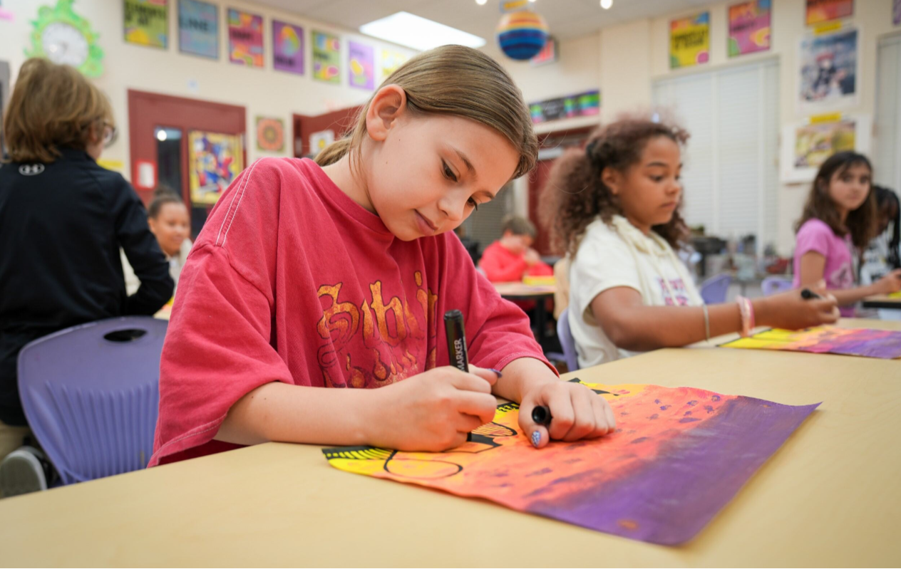 student in art class