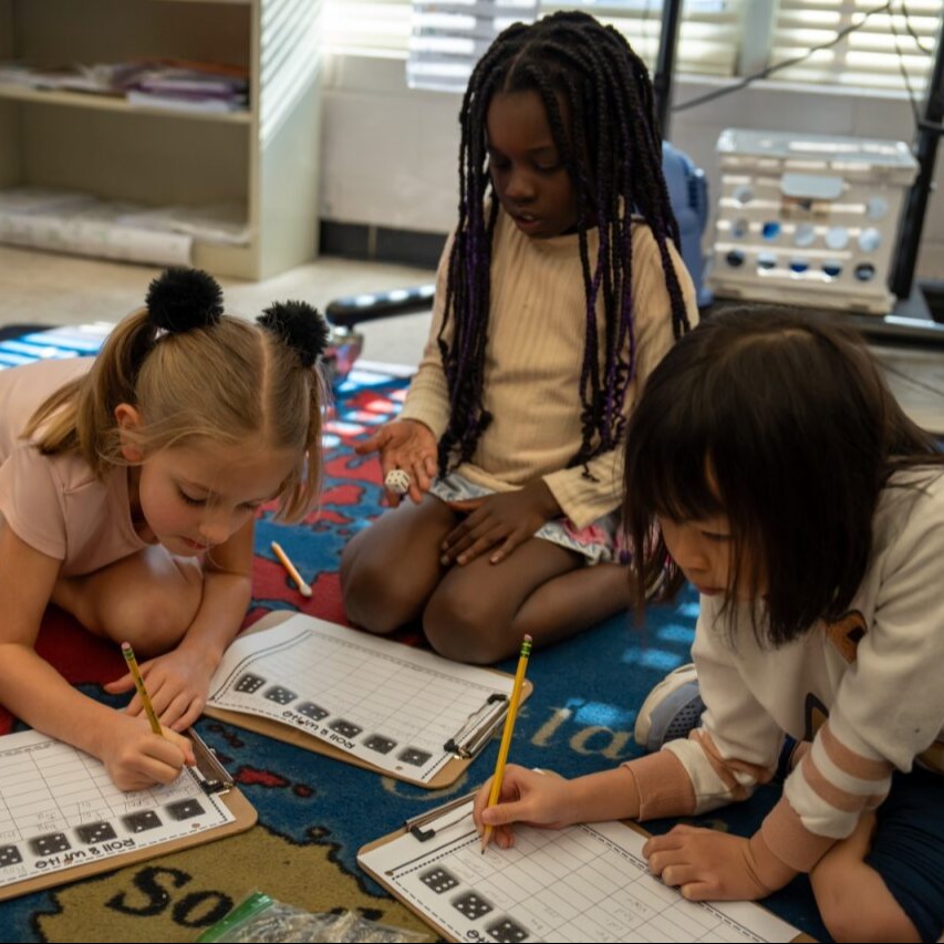three students working together