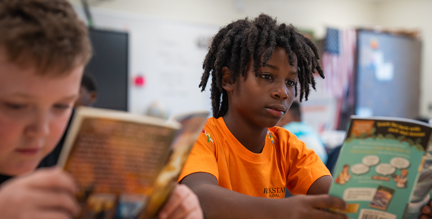 students reading books